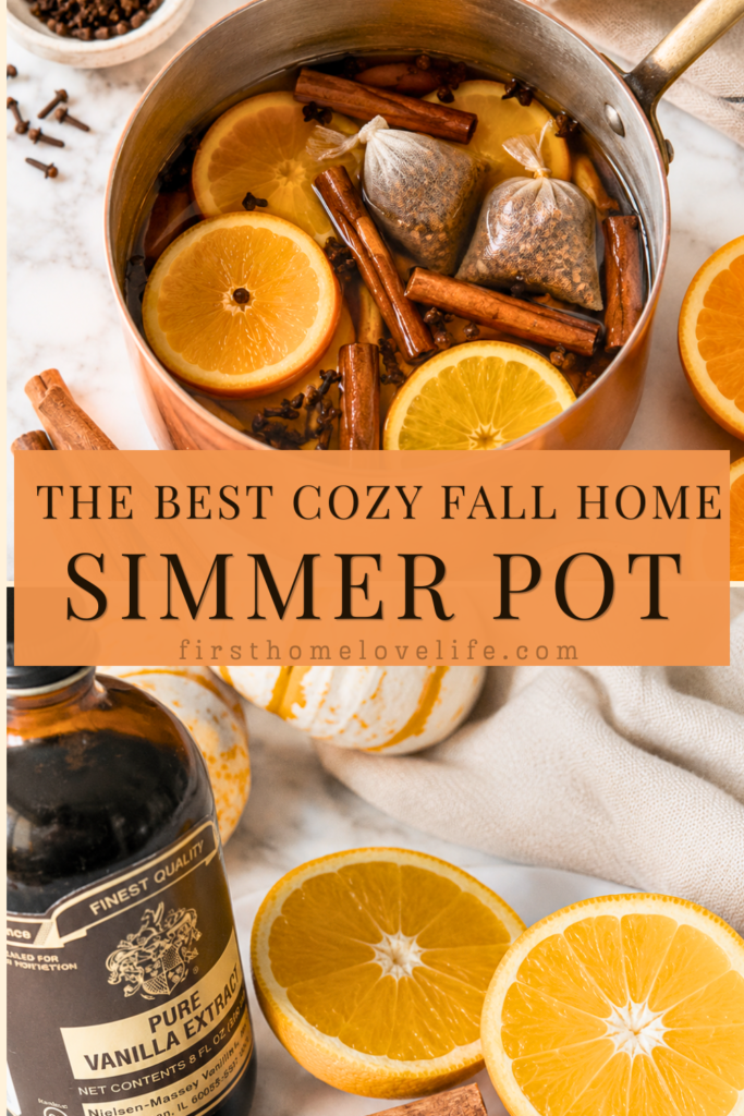 Pinterest graphic showing a copper pot filled with a homemade fall simmer pot recipe made with oranges, cinnamon sticks, cloves, vanilla, and mulling spices.