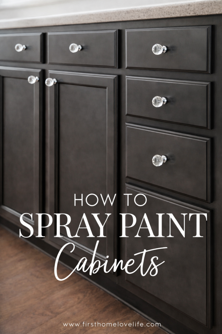 Dark gray spray painted kitchen cabinets with crystal knobs, shown in a vertical Pinterest-style image with text overlay explaining how to spray paint cabinets.