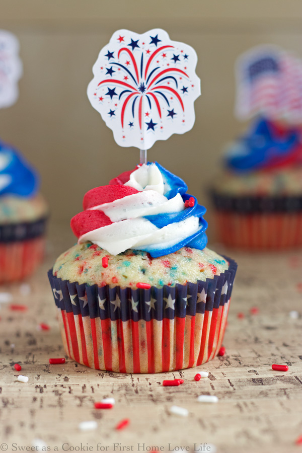 These Patriotic red white and blue funfetti cupcakes will be perfect for your Fourth of July BBQ! Find the easy recipe here at www.firsthomelovelife.com.