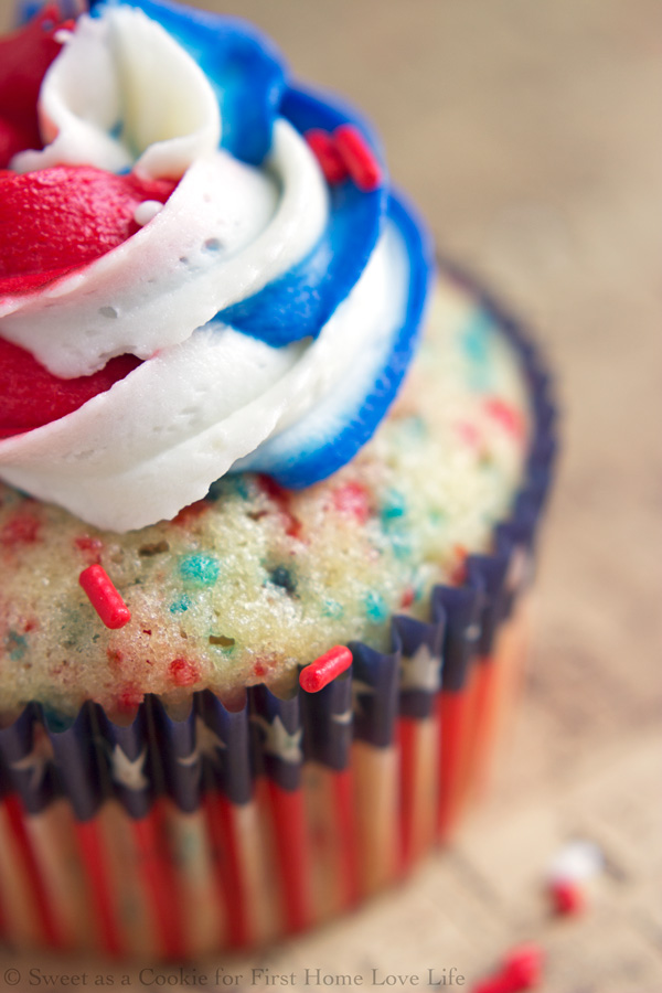 These Patriotic red white and blue funfetti cupcakes will be perfect for your Fourth of July BBQ! Find the easy recipe here at www.firsthomelovelife.com.