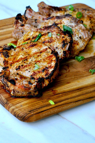 Sweet and savory pork chops oozing with juicy flavor! These grilled maple Dijon Pork Chops are going to be your new grilling favorite!