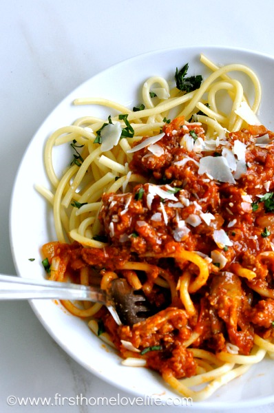 Bucatini noodles smothered in a super thick and robust ground turkey and sausage meat sauce. Comforting and delicious! 