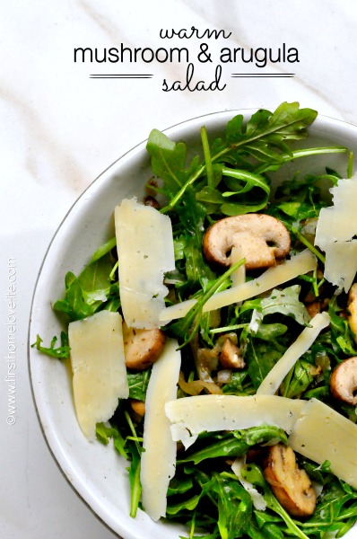 warm mushroom and arugula salad with lemon and parmesan