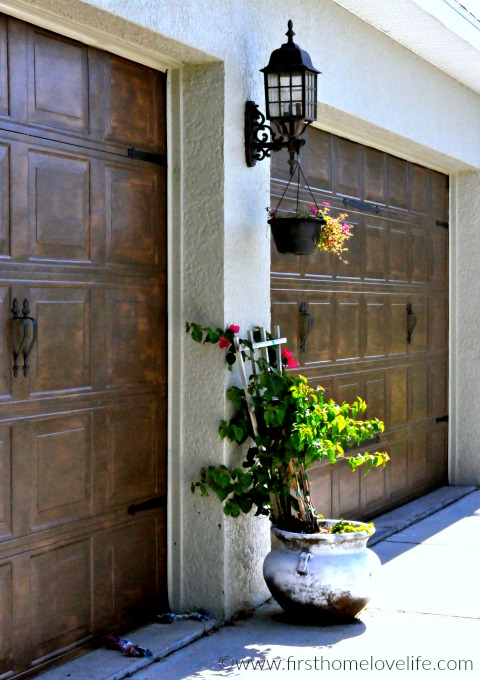 beautiful wood painted garage doors via www.firsthomelovelife.com