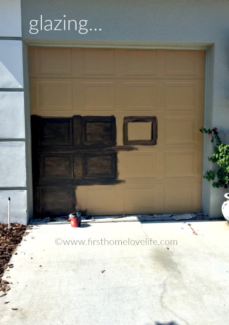 glazing the garage to make it look like wood via www.firsthomelovelife.com