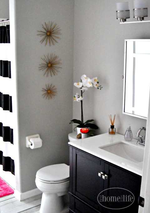 espresso bathroom vanity in gray bathroom via firsthomelovelife.com