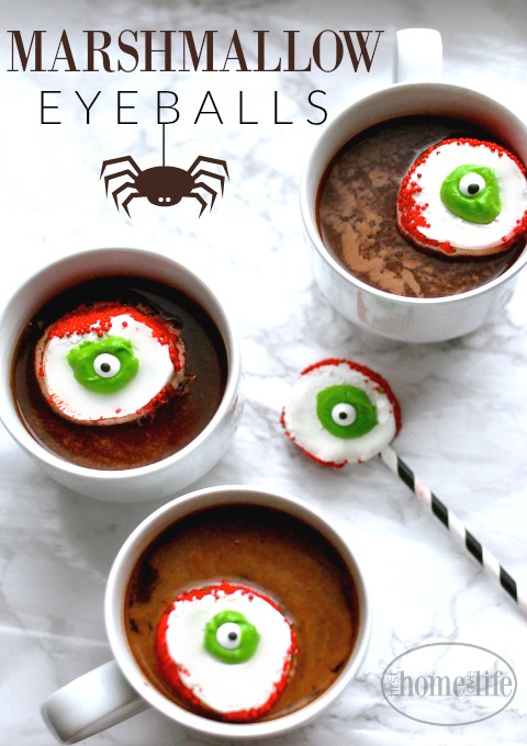 Halloween Hot Chocolate with Marshmallow Eyeballs. Perfect treat for kids this Halloween! via firsthomelovelife.com