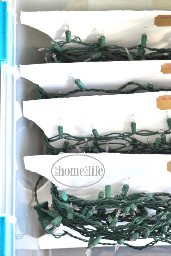 ORGANIZE CHRISTMAS LIGHTS SO THEY WONT BECOME TANGLED | Easy and inexpensive DIY Christmas storage solutions via firsthomelovelife.com