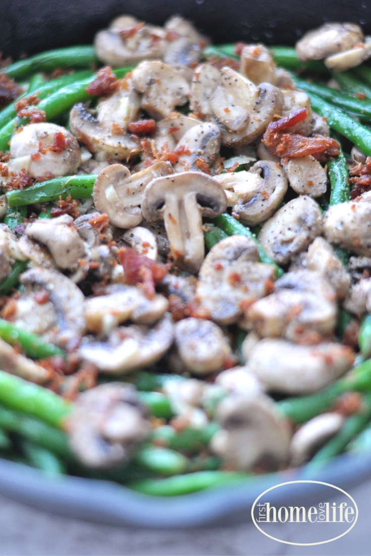 These bacon mushroom green beans are the perfect side dish to make and pair well with chicken, beef, pork or just eat it on its own via firsthomelovelife.com