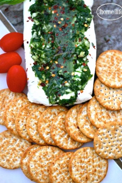 the easiest and best garlic and herb cheese spread you can make for any get together during the holidays or any celebration via firsthomelovelife.com