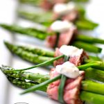 filet mignon wrapped asparagus appetizer | perfect finger food for the holidays via firsthomelovelife.com