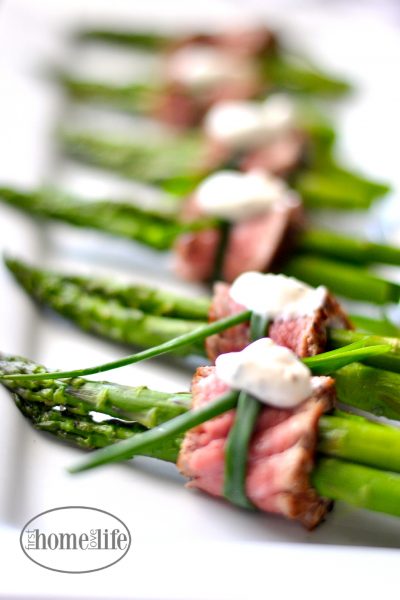 filet mignon wrapped asparagus appetizer | perfect finger food for the holidays via firsthomelovelife.com