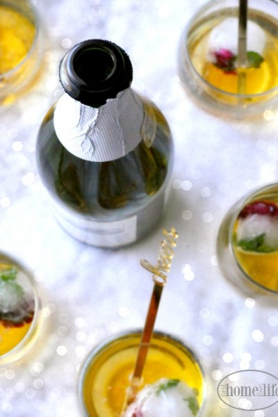 POP FIZZ CLICK | add some fruit infused ice balls to your holiday drinks via firsthomelovelife.com