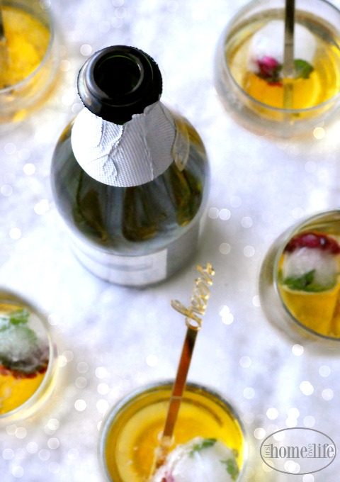 POP FIZZ CLICK | add some fruit infused ice balls to your holiday drinks via firsthomelovelife.com