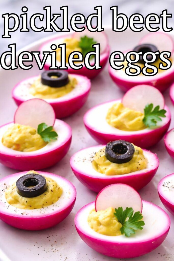 Pickled beet deviled eggs with bright pink edges and creamy filling on a white platter with text overlay