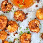 Coconut fried shrimp recipe with the perfect sweet and spicy chili apricot dipping sauce via firsthomelovelife.com