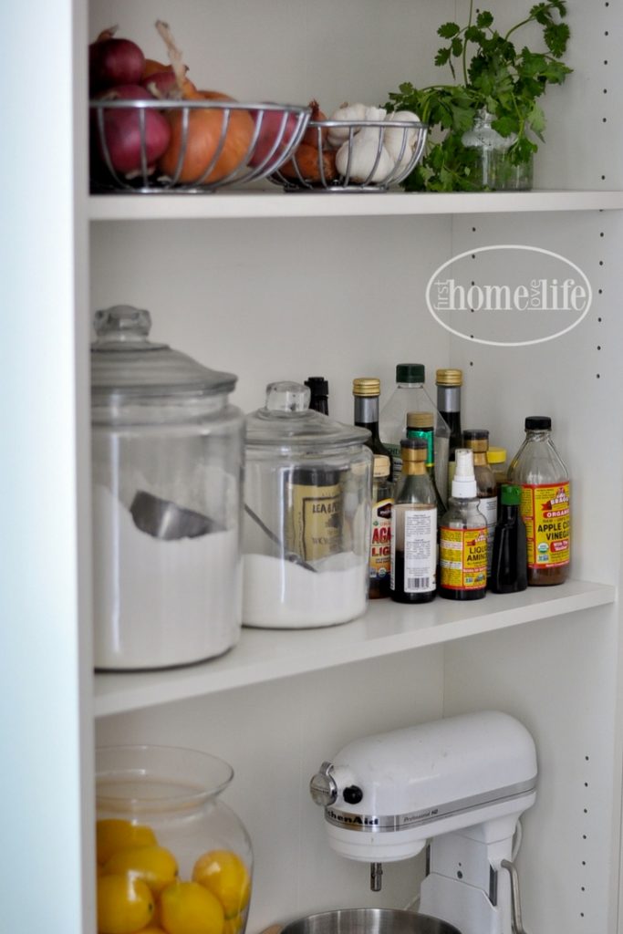 Simple kitchen storage solution| open pantry organization using IKEA Billy bookshelves via firsthomelovelife.com