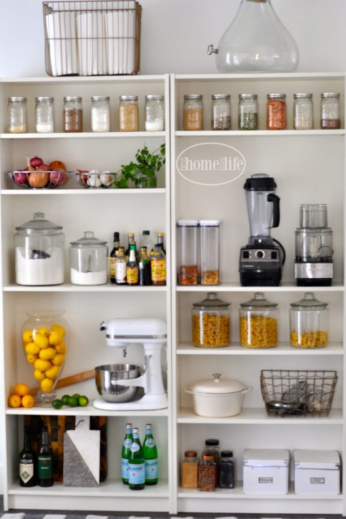 Simple kitchen storage solution| open pantry organization using IKEA Billy bookshelves via firsthomelovelife.com
