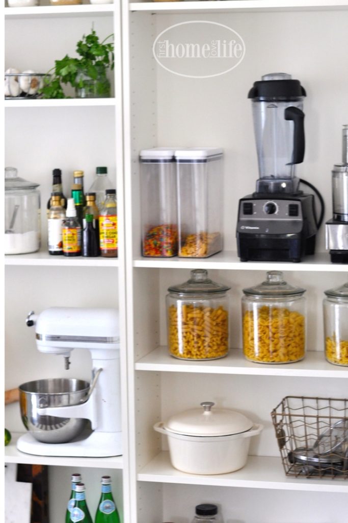 Simple kitchen storage solution| open pantry organization using IKEA Billy bookshelves via firsthomelovelife.com