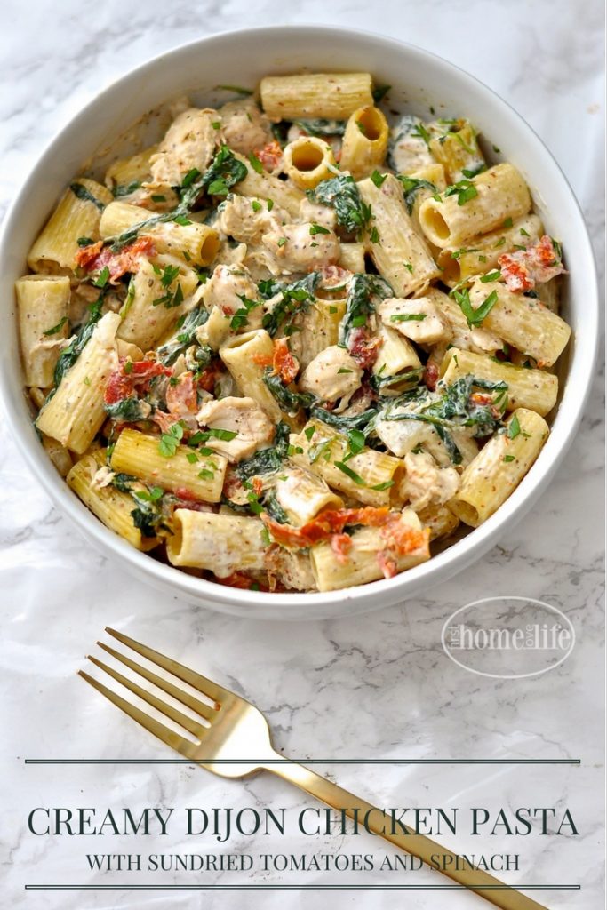 Creamy Dijon Chicken Pasta with Sun Dried Tomatoes and Spinach recipe via firsthomelovelife.com