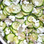 this sauteed zucchini with feta is a quick and delicious side dish that pairs great with anything! Recipe via firsthomelovelife.com