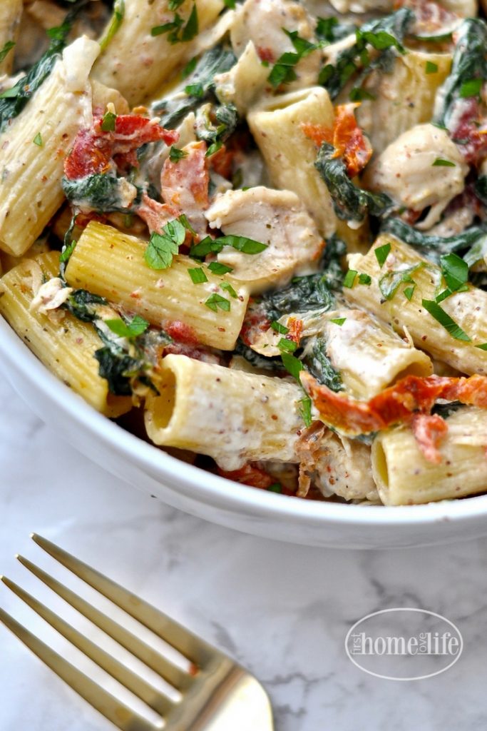 Creamy Dijon Chicken Pasta with Sun Dried Tomatoes and Spinach recipe via firsthomelovelife.com