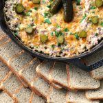 This game day favorite appetizer is the perfect party starter! Get the recipe for this Hot Roast Beef Dip served with rye bread toasts- yum! via firsthomelovelife.com