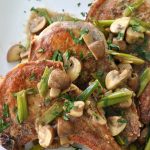 pork chops with mushroom and onion gravy via firsthomelovelife.com