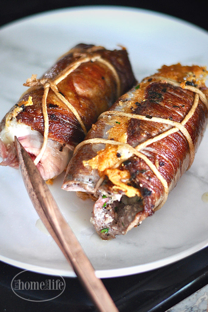 ROLLED UP FLANK STEAK WITH CHEESE AND BREADCRUMBS COOKED IN TOMATO SAUCE VIA FIRSTHOMELOVELIFE.COM