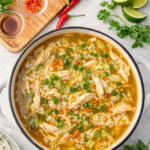 Easy Saigon chicken rice soup with shredded chicken, jasmine rice, and ginger broth