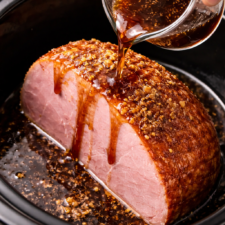 slow-cooker-ham-glaze-poured-