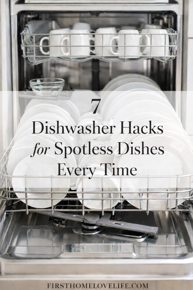 open dishwasher loaded with white plates and mugs showing simple dishwasher hacks for spotless dishes