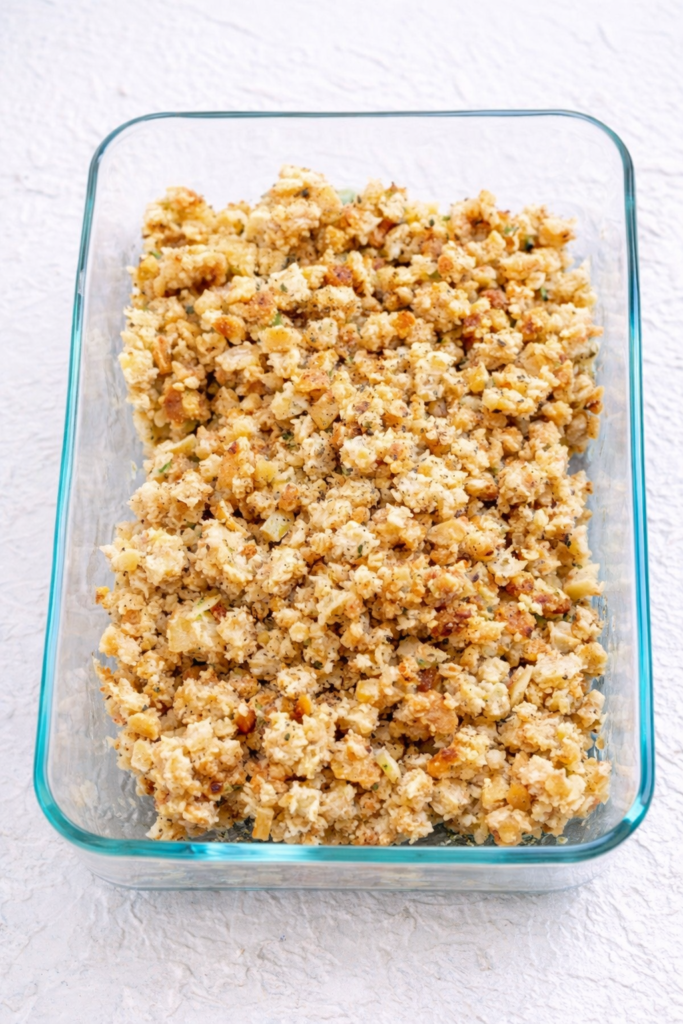 Boxed stuffing mix cooked in a glass baking dish for a budget Easter dinner