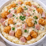 chicken cordon bleu mashed potato bowl with popcorn chicken ham swiss cheese and creamy dijon sauce