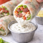 club sandwich rice paper spring roll dipped in ranch dressing with turkey bacon lettuce and tomato filling