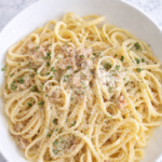 garlicky linguine in white clam sauce with chopped parsley and lemon