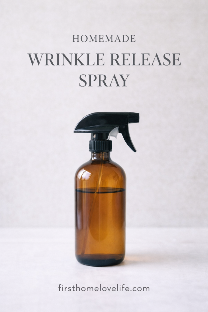 Amber glass spray bottle representing homemade wrinkle release spray for removing wrinkles from clothes without an iron