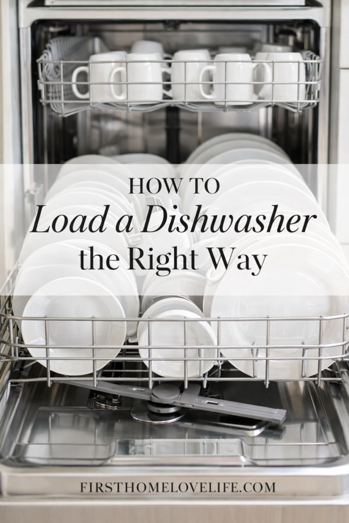 open dishwasher loaded correctly with white plates bowls and mugs organized properly