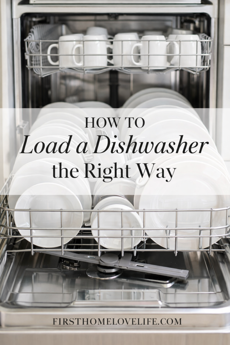 open dishwasher loaded correctly with white plates bowls and mugs organized properly