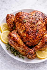 Juicy, golden rotisserie chicken with a savory, slightly sweet marinade inspired by the classic Kenny Rogers flavor