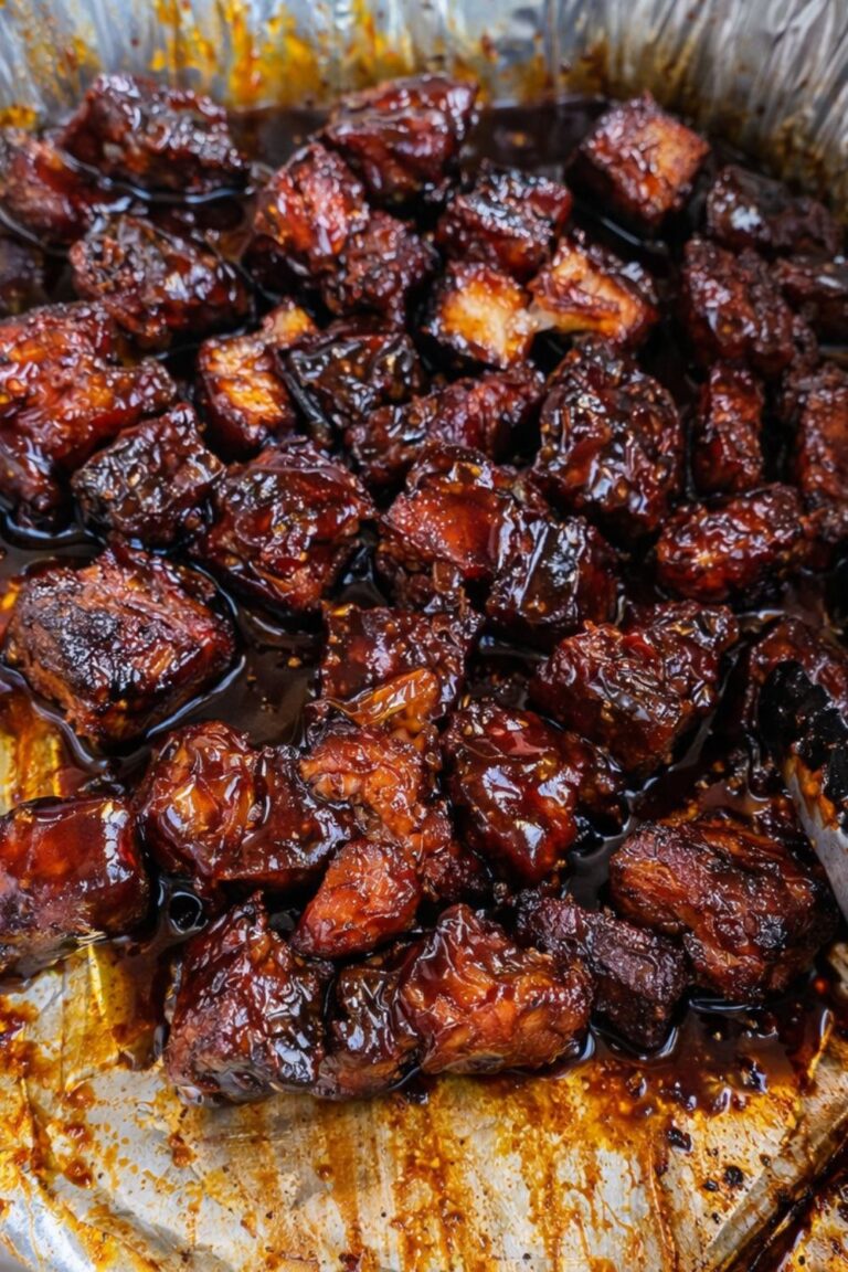 sticky oven baked pork belly burnt ends coated in caramelized barbecue sauce