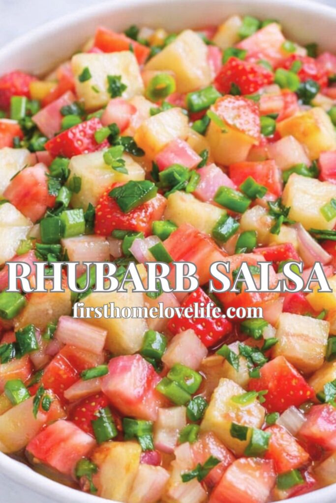 Fresh rhubarb salsa with strawberries, jalapeño, and herbs in a white bowl