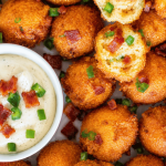 Easy bacon jalapeño hush puppies with ranch dipping sauce, crispy Southern cornmeal fritters loaded with bacon and jalapeños.