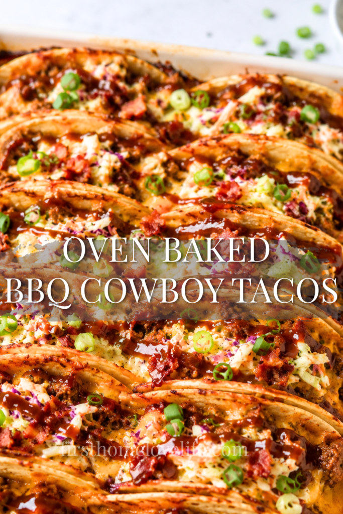 Oven baked BBQ cowboy tacos topped with coleslaw, bacon, green onions, melted cheese, and barbecue sauce in crispy tortillas.