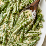 Creamy Boursin green beans coated in a garlic and herb cheese sauce