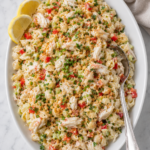 Creamy crab cake pasta salad with lump crabmeat, shell pasta, vegetables, fresh herbs, Old Bay and buttery cracker crumbs.