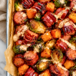 One pan sausage with roasted butternut squash and Brussels sprouts drizzled with creamy apple cider Dijon sauce