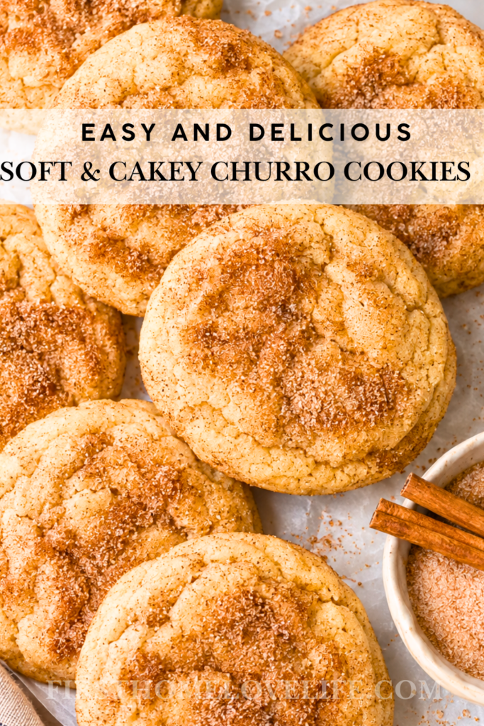 Soft and cakey cinnamon churro cookies coated with cinnamon sugar and served with cinnamon sticks.